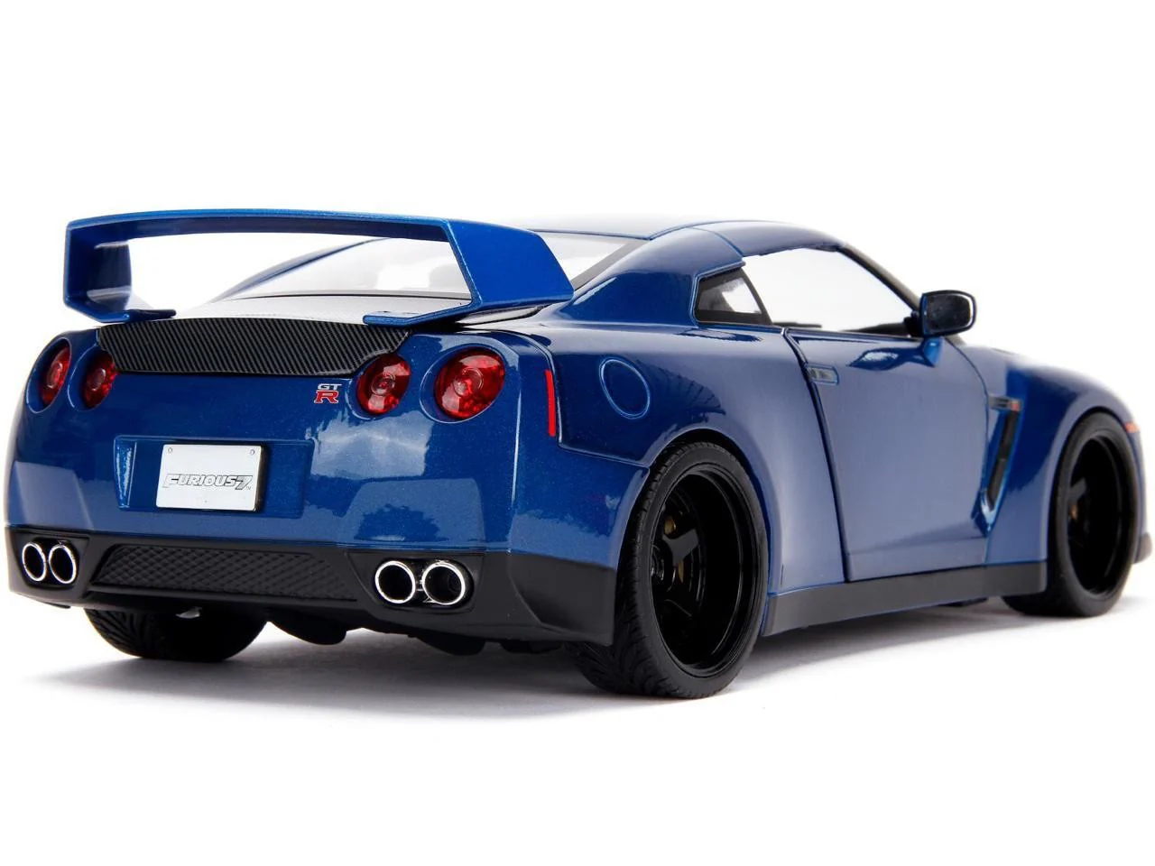2009 Nissan GT-R R35 Blue Metallic and Carbon Model with Lights and Brian Figurine - Image 7
