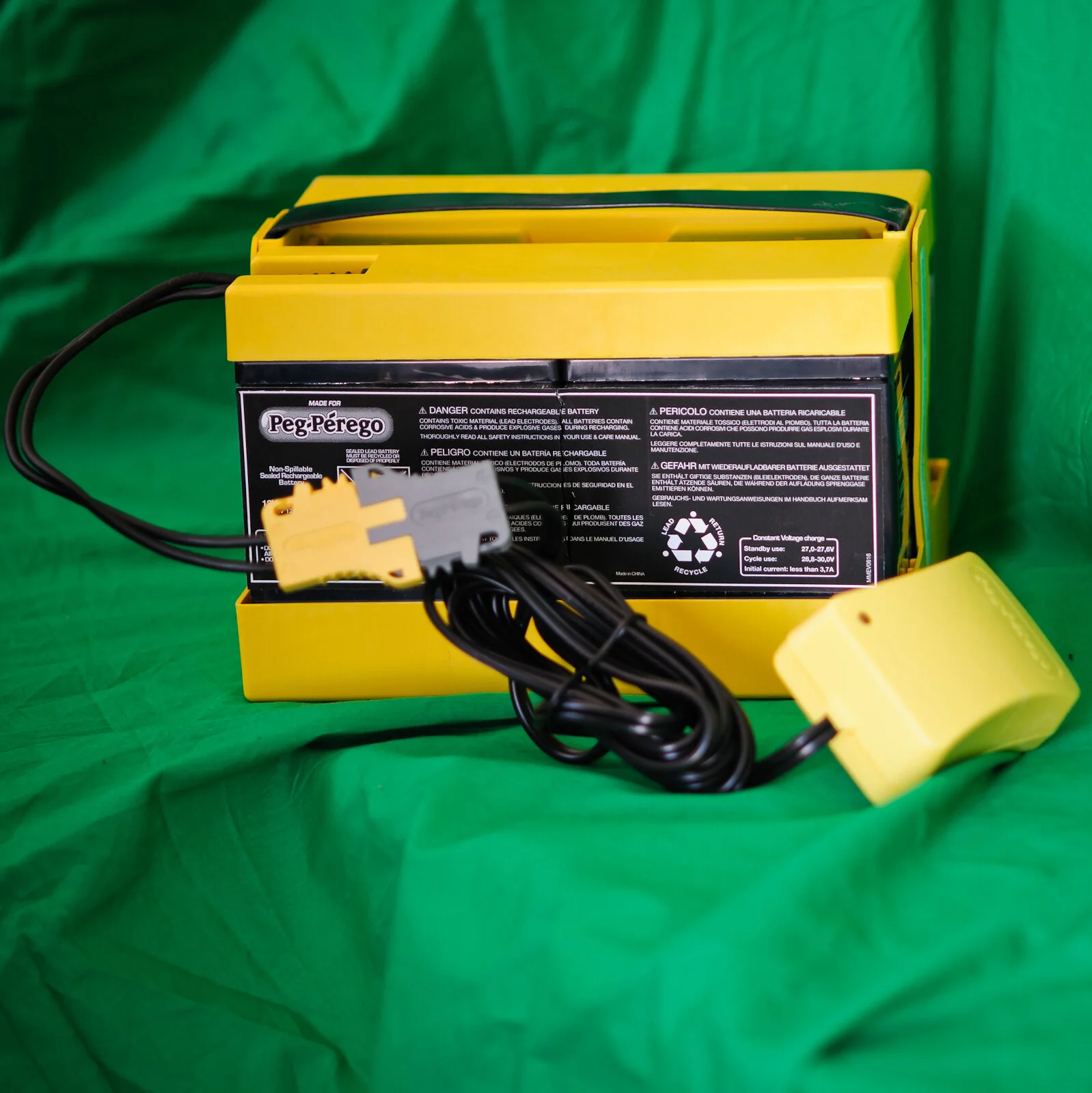 Power Up Your Ride with Peg Perego 24V Battery & Charger Combo Pack (IAKB0522) - Image 3